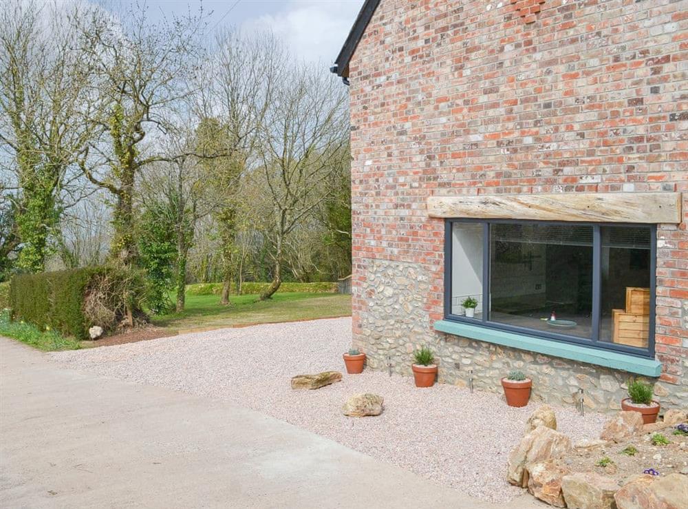 Charming stone-built barn, lovingly converted to a holiday home at The Wheel House in Easthill, near Ottery St Mary, Devon