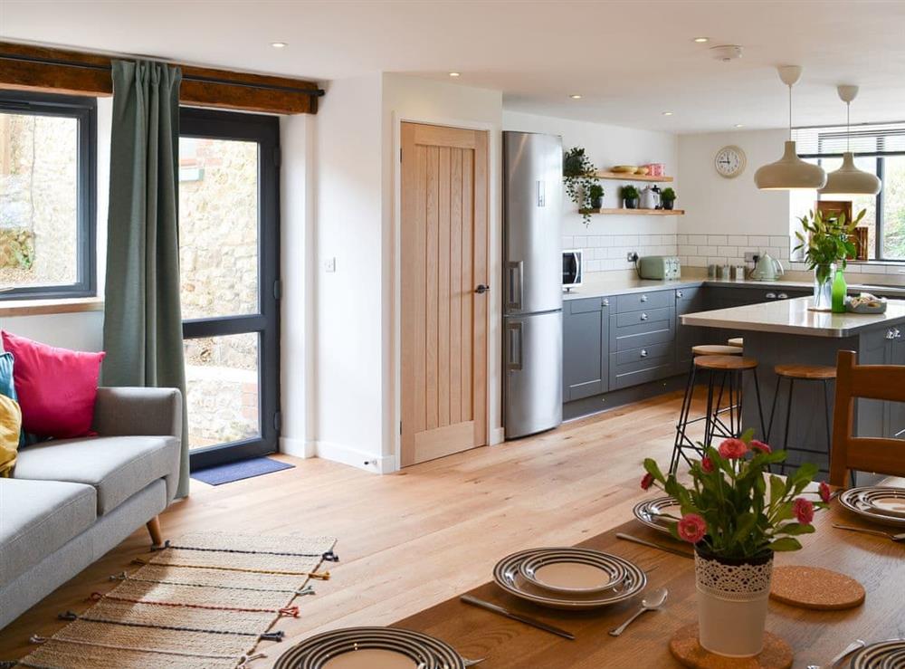 Kitchen/dining room with garden access at The Wheel House in Easthill, near Ottery St Mary, Devon