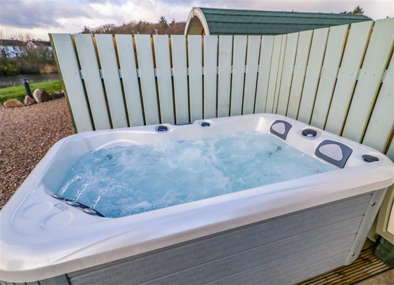 Relax in the hot tub at The Wheelhouse Pod No. 1, Burtonport