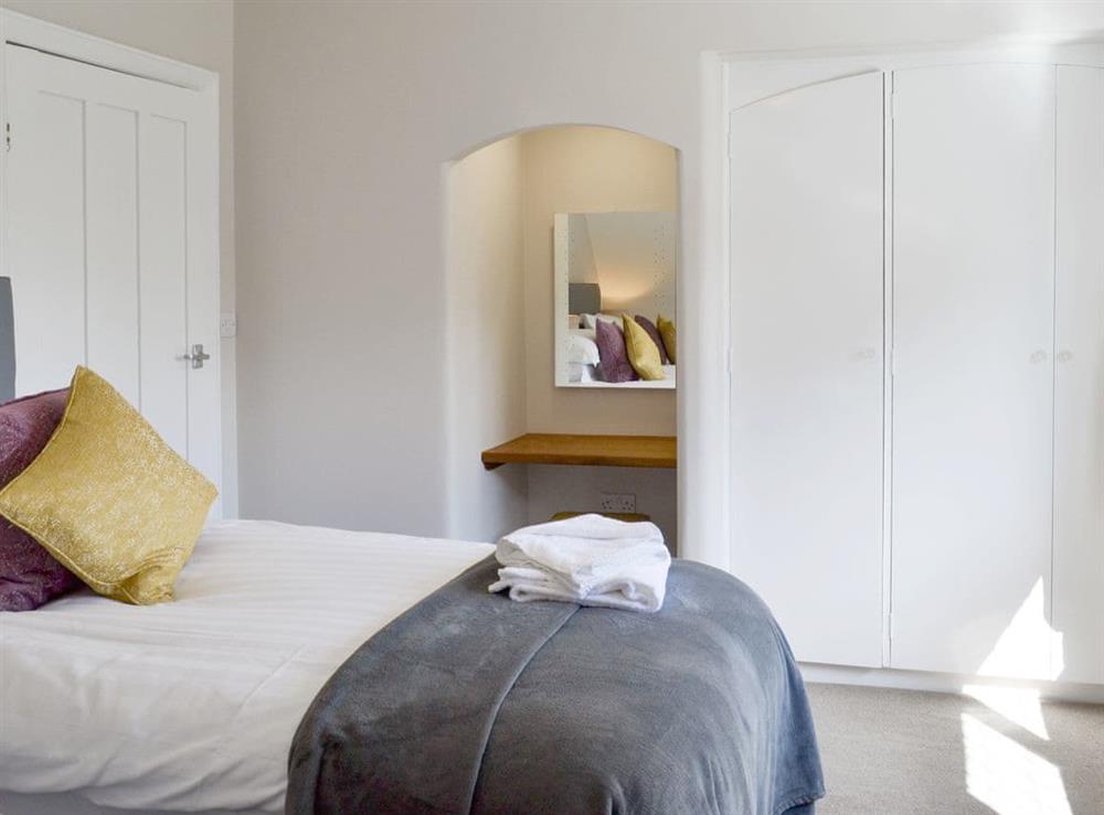 Ample storage within the en suite twin bedroom at The Whins in Ganton, near Filey, North Yorkshire