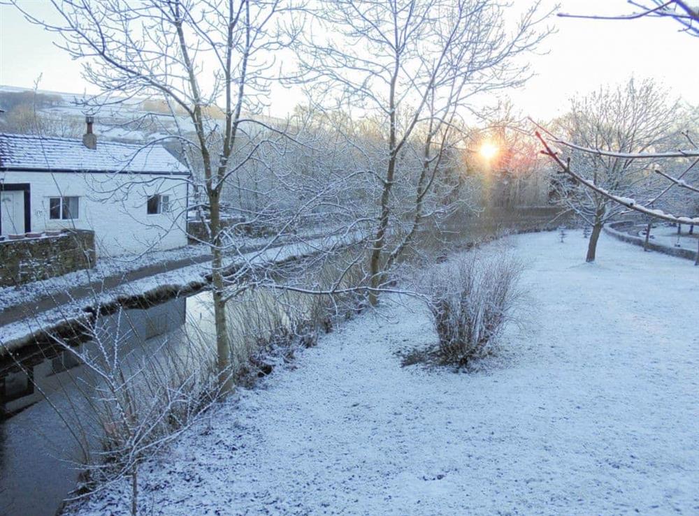 Beautiful location canalside in winter at The White Cottage in Furness Vale, near Whaley Bridge, Derbyshire