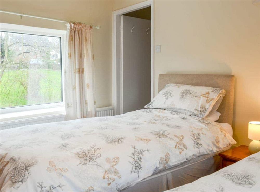 Comfy twin bedroom at The White Cottage in Furness Vale, near Whaley Bridge, Derbyshire