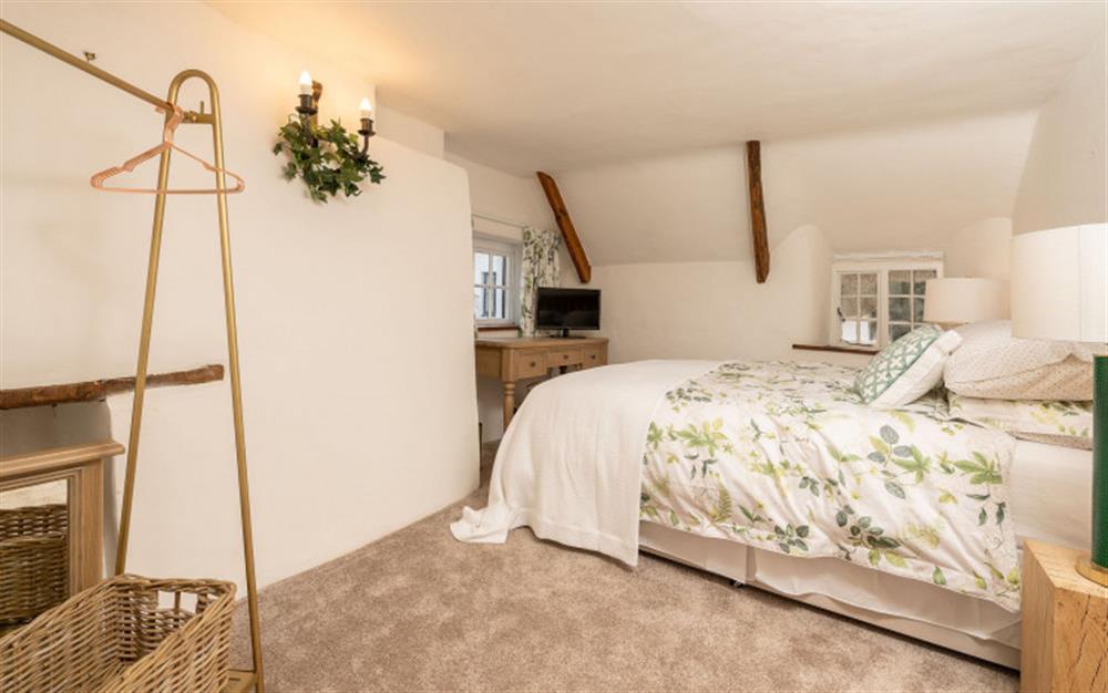 Master bedroom  at The White Cottage in South Milton