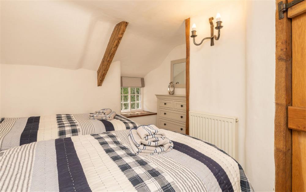 The twin bedroom at The White Cottage in South Milton