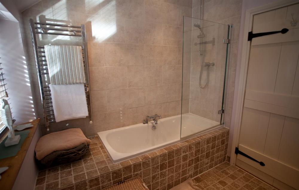 Family bathroom with a bath, twin basins, wc and overhead shower attachment (photo 2) at The White House, Little Weighton
