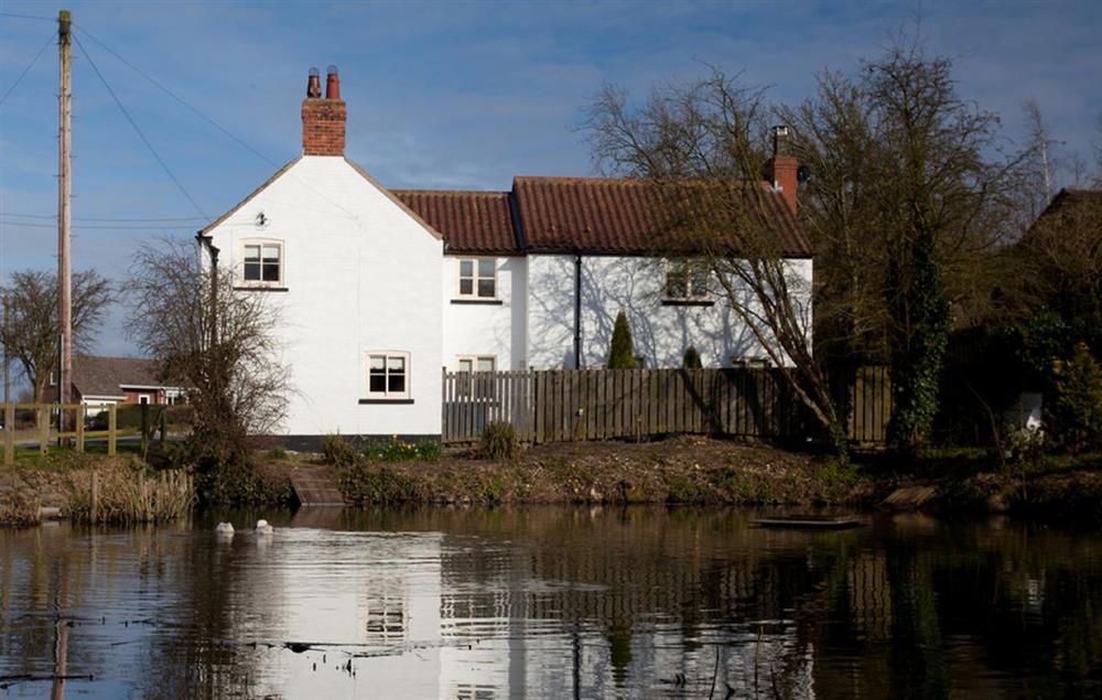 The property overlooks the village pond at The White House, Little Weighton