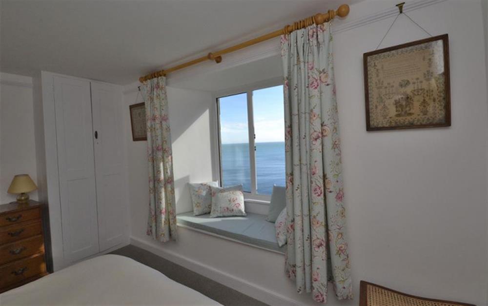 Another view of bedroom 4 with window seat and views of the sea. at The White House in Torcross