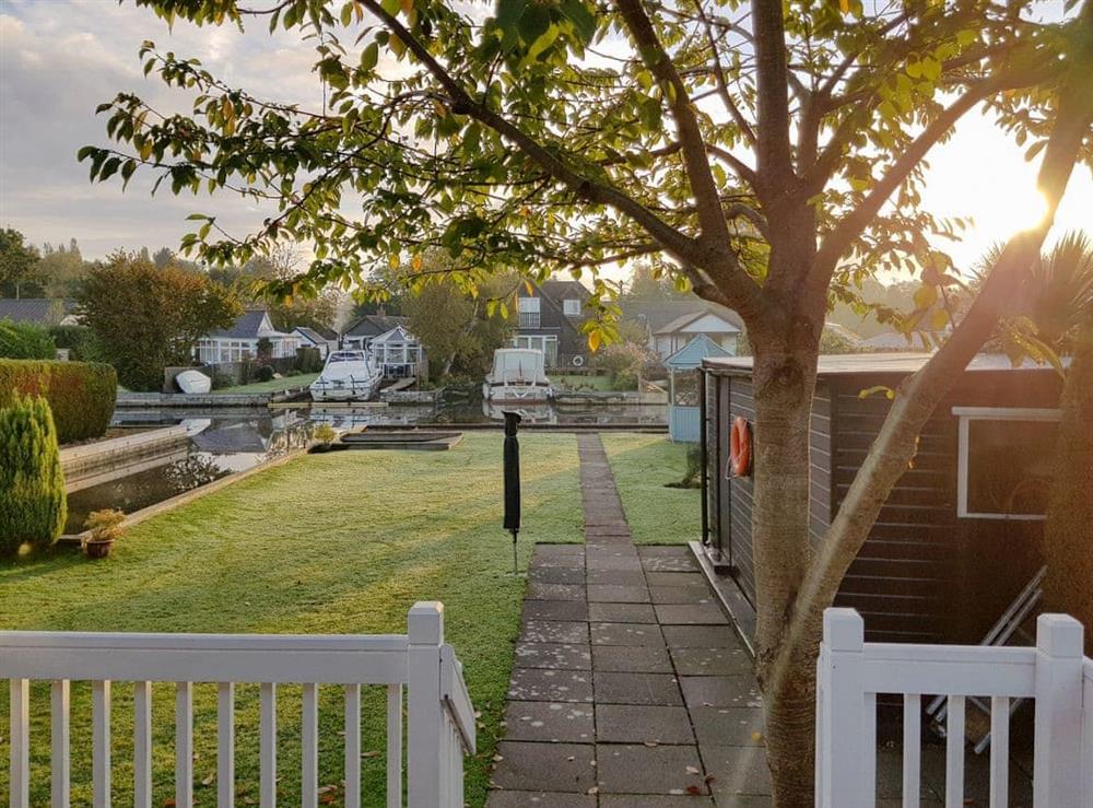 Delightful garden with access to the river at The Willows in Wroxham, Norfolk