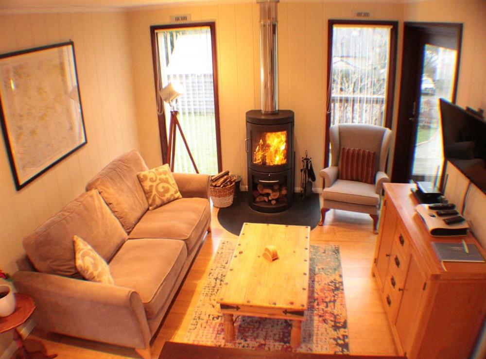 Living area at The Wooden Lodge in Upper Lye, near Presteigne, Herefordshire