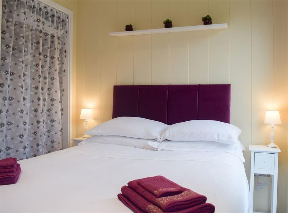 Tranquil double bedroom at The Wooden Lodge in Upper Lye, near Presteigne, Herefordshire