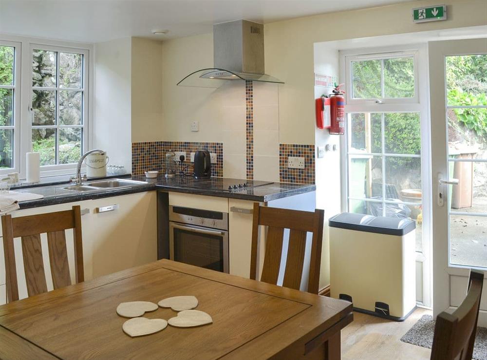 Well equipped kitchen/ dining area at Snowdon, 