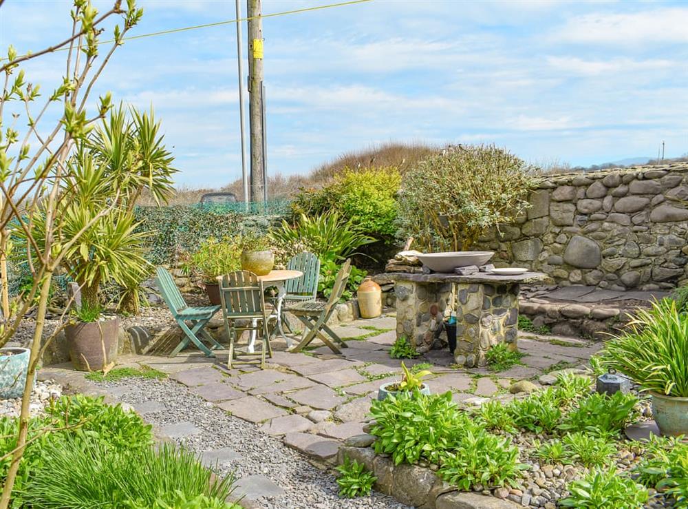 Garden at The Yard Beach Cottage in Aberdesach, near Caernarfon, Gwynedd