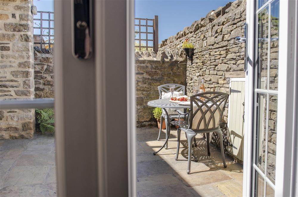 Access from the kitchen breakfast room to the rear courtyard area at Theaked Stones, Leyburn