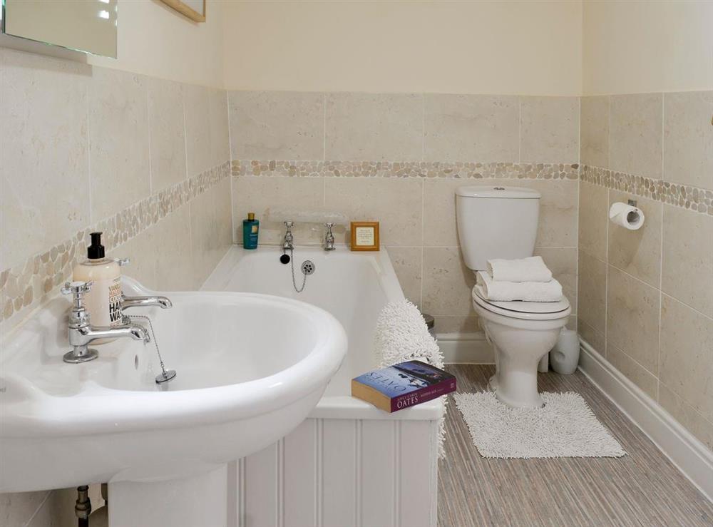 En-suite bathroom with separate walk-in shower at Thimble Cottage in Hartland, North Devon., Great Britain