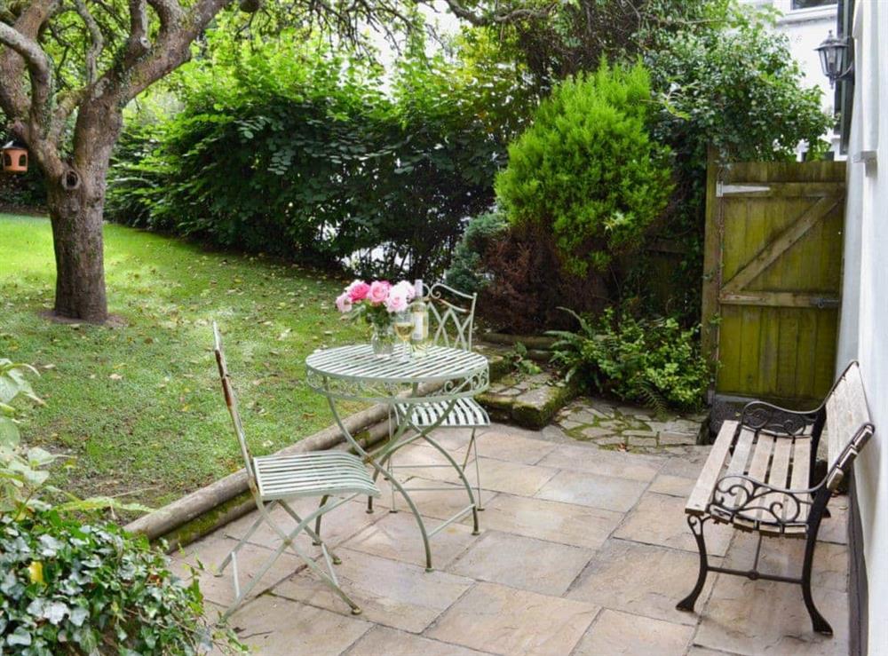 Large garden with patio, sitting-out area and furniture (photo 2) at Thimble Cottage in Hartland, North Devon., Great Britain