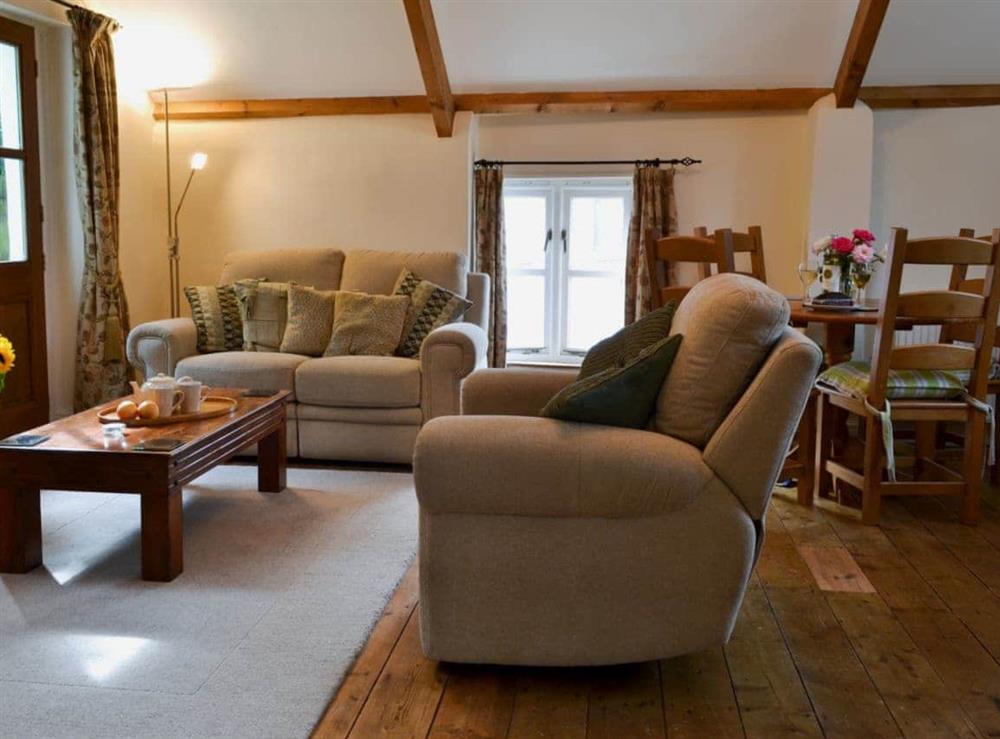 Open plan living/dining room/kitchen (photo 2) at Thimble Cottage in Hartland, North Devon., Great Britain