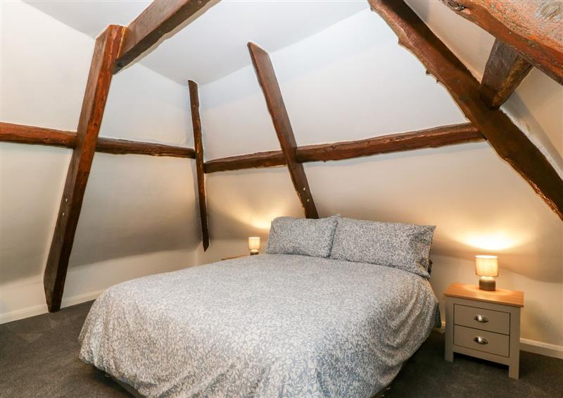 A bedroom in Thimble cottage at Thimble cottage, Winterborne Stickland near Blandford Forum