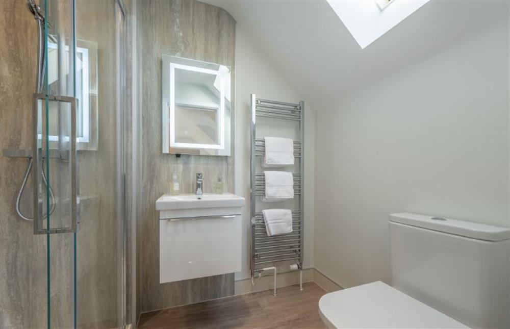 First floor: Master en-suite with shower, wash basin and WC at Thistledown, Thornham near Hunstanton