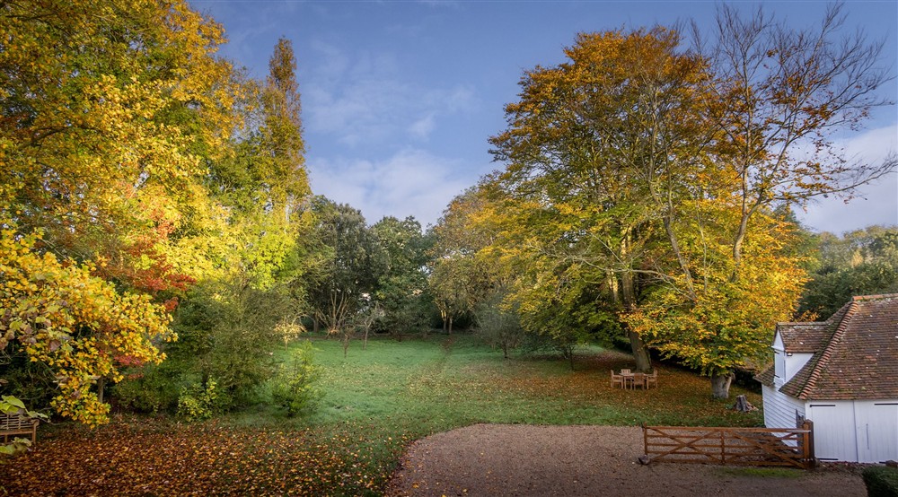 An aerial view of the garden at Thorington Hall in Stoke By Nayland, Suffolk