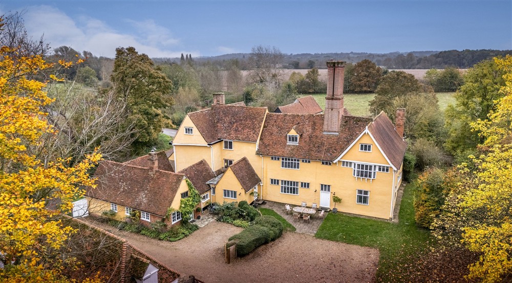 An aerial view of Thorington Hall on the right and Thorington Lodge on the left, Suffolk at Thorington Hall in Stoke By Nayland, Suffolk