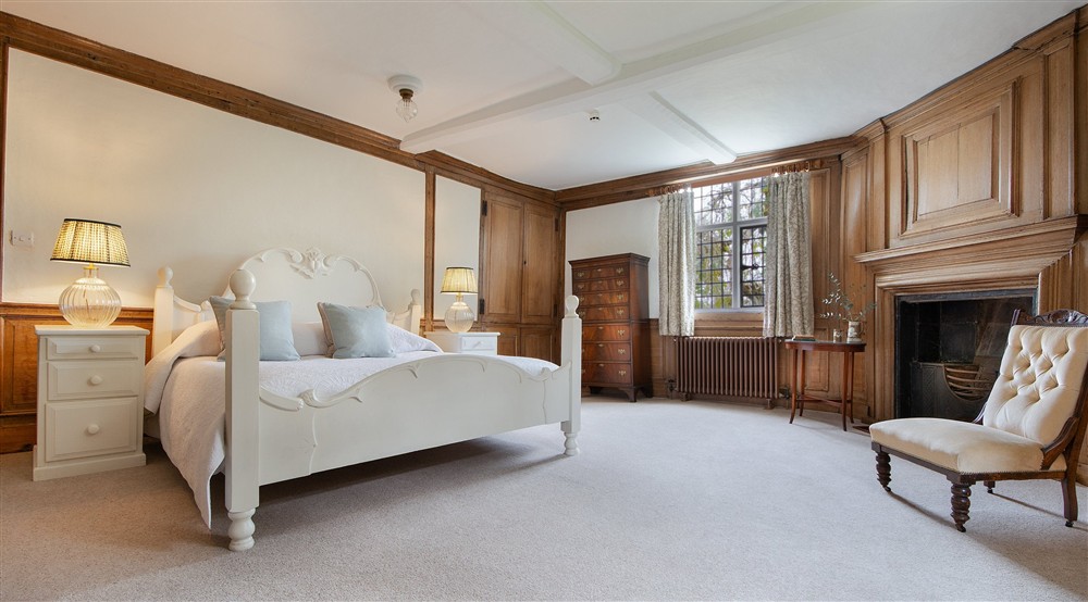 Bedroom 3 Partridge, with a super king-size bed, on the first floor of Thorington Hall, Suffolk at Thorington Hall in Stoke By Nayland, Suffolk