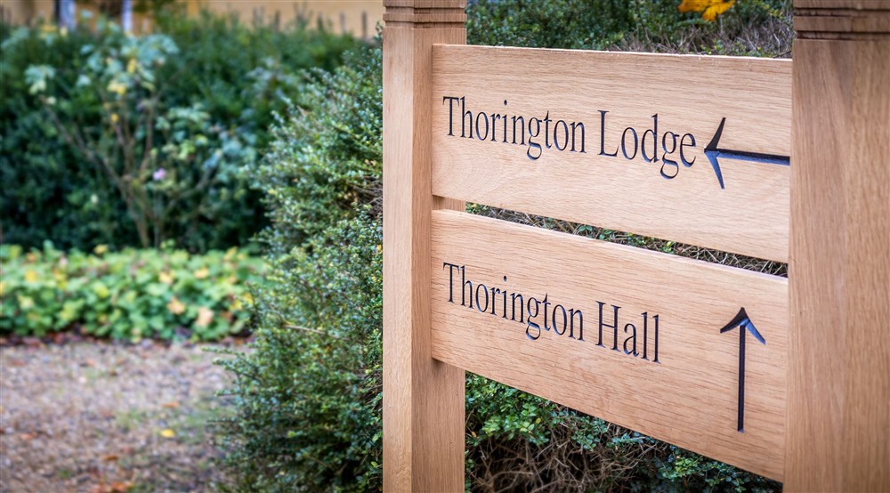 The signs for Thorington Hall and Thorington Lodge, which are neighbouring holiday cottages, Suffolk at Thorington Hall in Stoke By Nayland, Suffolk