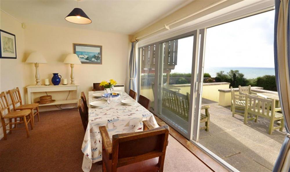 Dining room with patio doors and fantastic views at Thorpe Arnold Major in Thurlestone