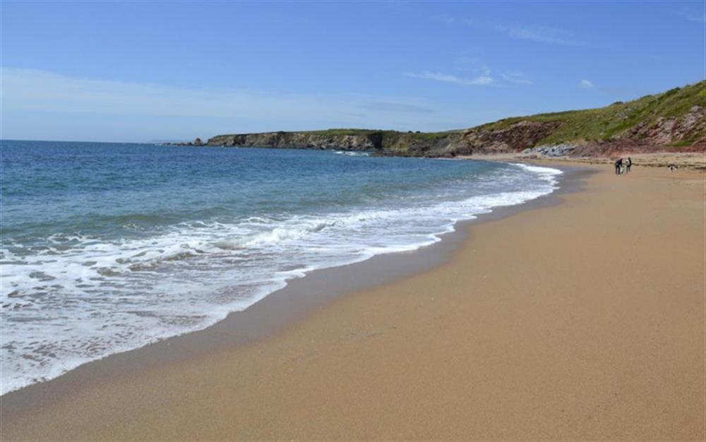 Thurlestone Sands, home to the famous 'thirled' rock from which the village takes its name