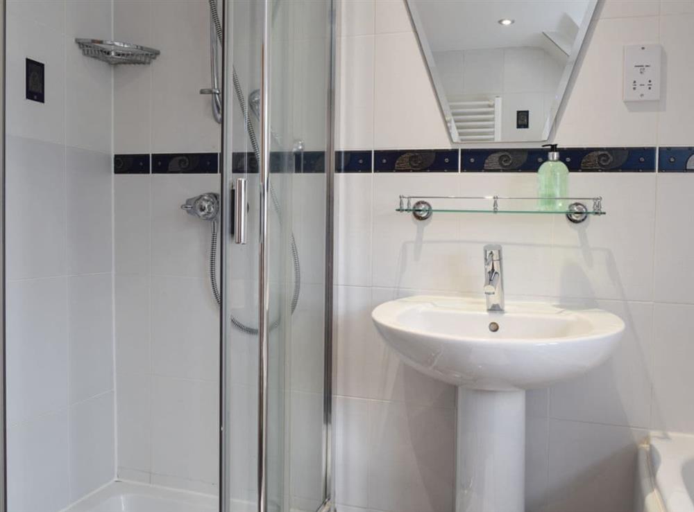 Bathroom with shower cubicle at Three Batch Cottages in Chaddesley Corbett, near Bromsgrove, Worcestershire