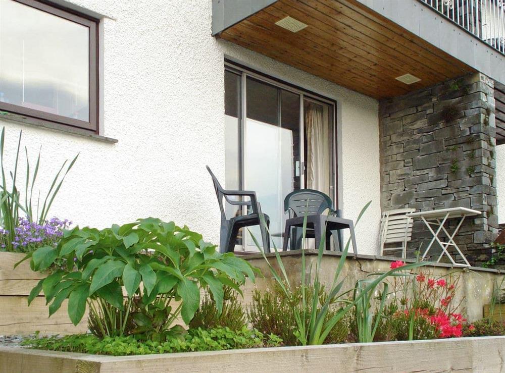 Sitting out area on terrace at front of property at Three Fells in Ambleside, Cumbria