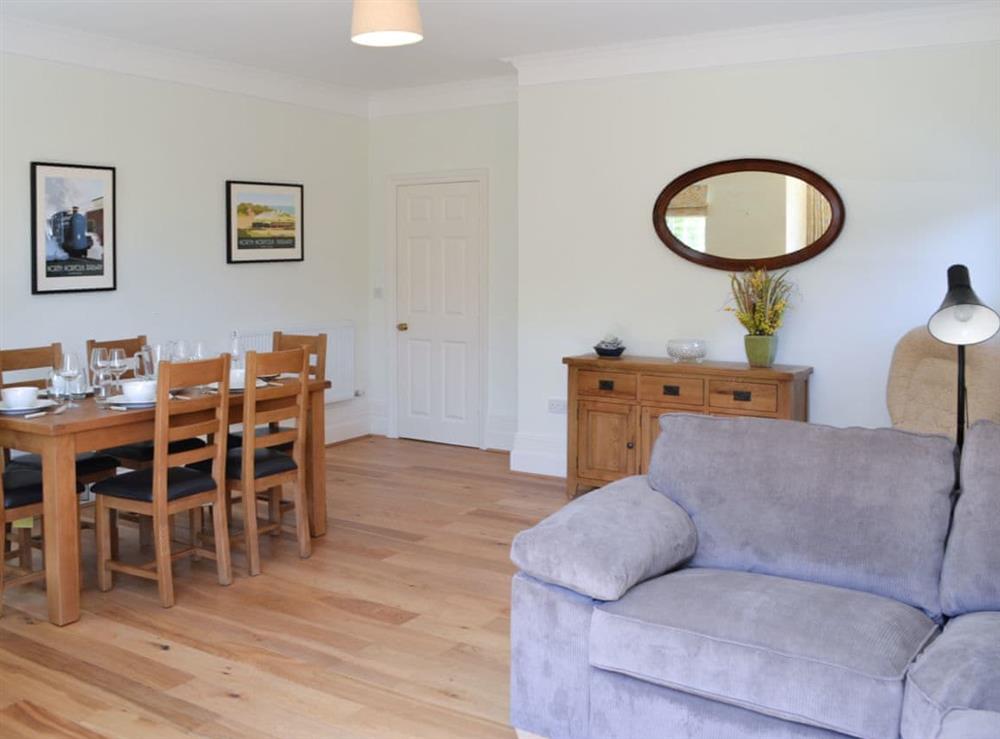 Large honely living/dining room at Three The Boulevard in Sheringham, Norfolk, England