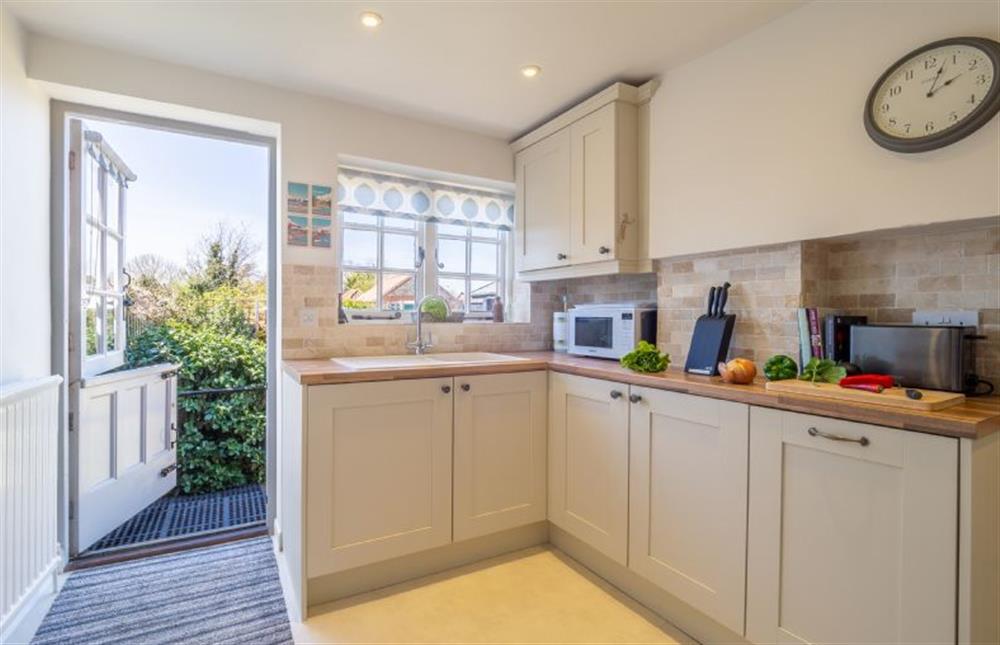 Ground floor: Kitchen with stable door to garden at Three Tuns, Great Walsingham