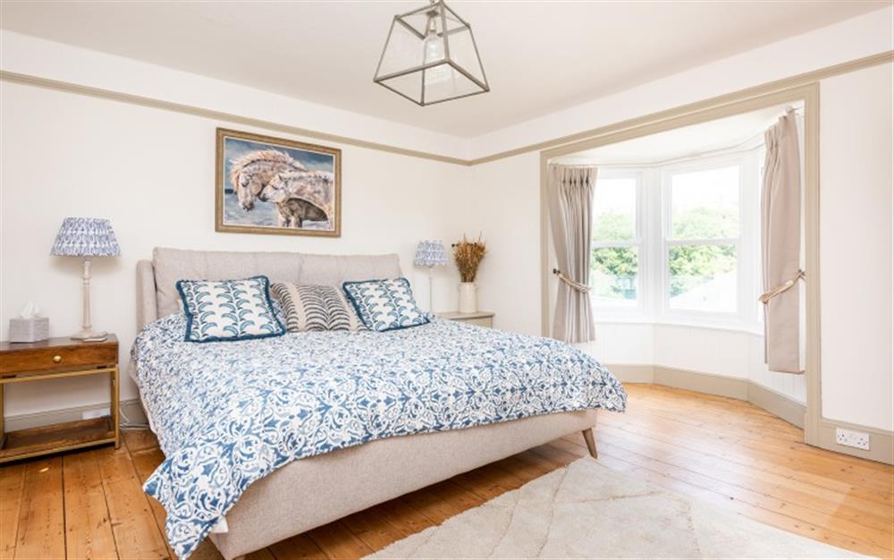 Alternative view of the bright and spacious bedroom with bay window. at Three Views in Dartmouth