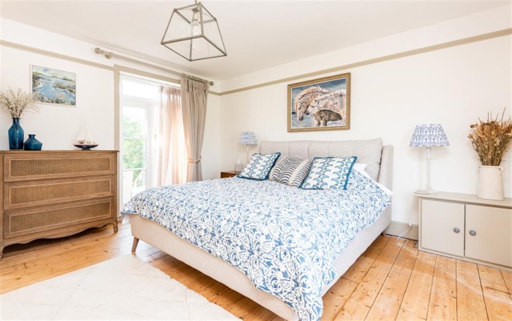 Spacious and well-presented bedroom with 5ft king size bed. at Three Views in Dartmouth
