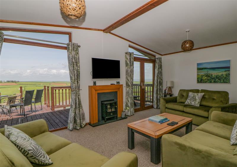 Relax in the living area at Three Views Lodge, Millbrook
