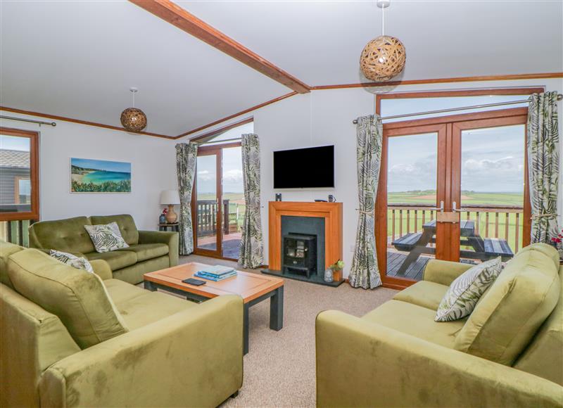 Relax in the living area at Three Views Lodge, Whitsand Bay Fort Holiday Village