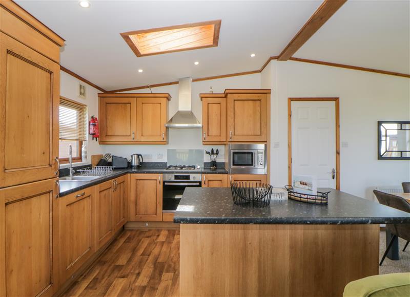 This is the kitchen at Three Views Lodge, Whitsand Bay Fort Holiday Village