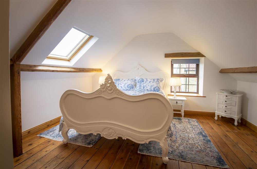 Bedroom two nestled in the eves at Threpnybit Cottage, Pockley