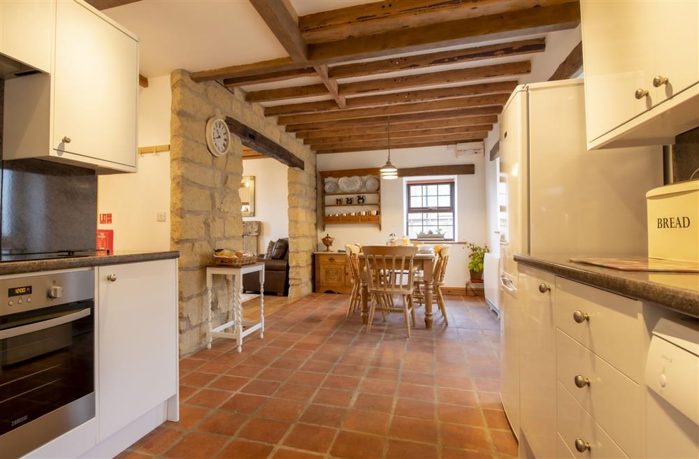 Open-plan kitchen and dining area at Threpnybit Cottage, Pockley