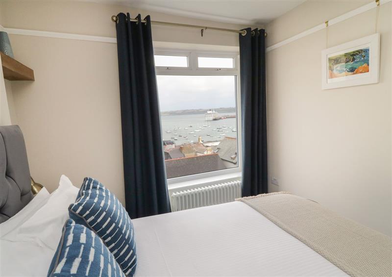 This is a bedroom at Through The Porthole, Falmouth