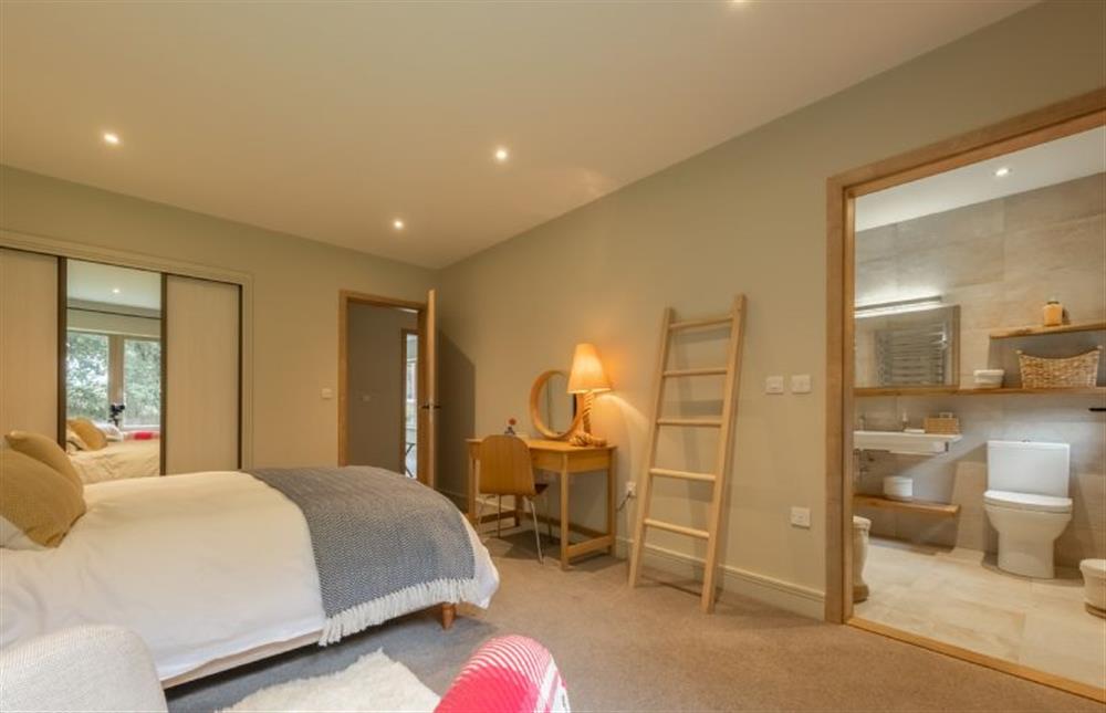 Ground floor: Bedroom four has king-size bed and en-suite shower room at Thursford Castle, Great Snoring