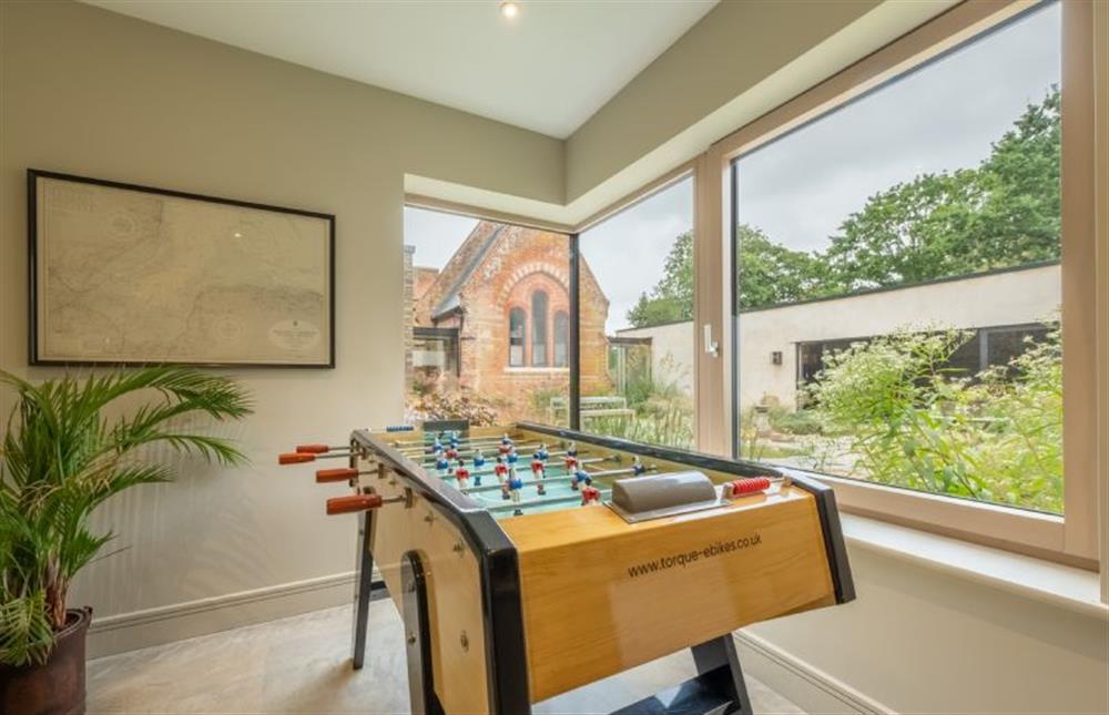 Ground floor: Table football in the study / games room at Thursford Castle, Great Snoring