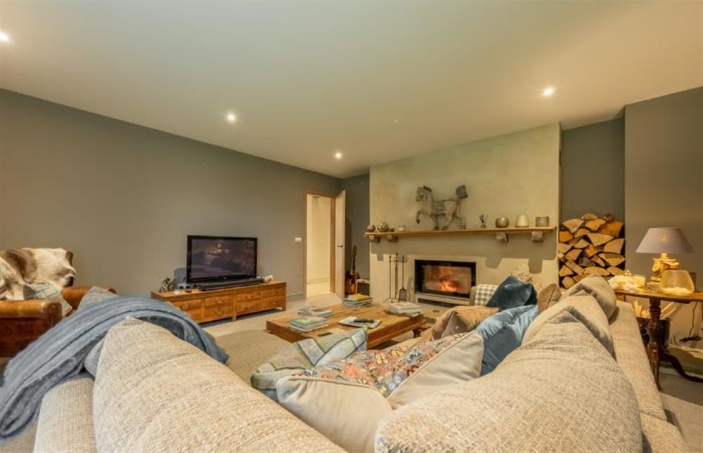 Ground floor: The snug with television at Thursford Castle, Great Snoring