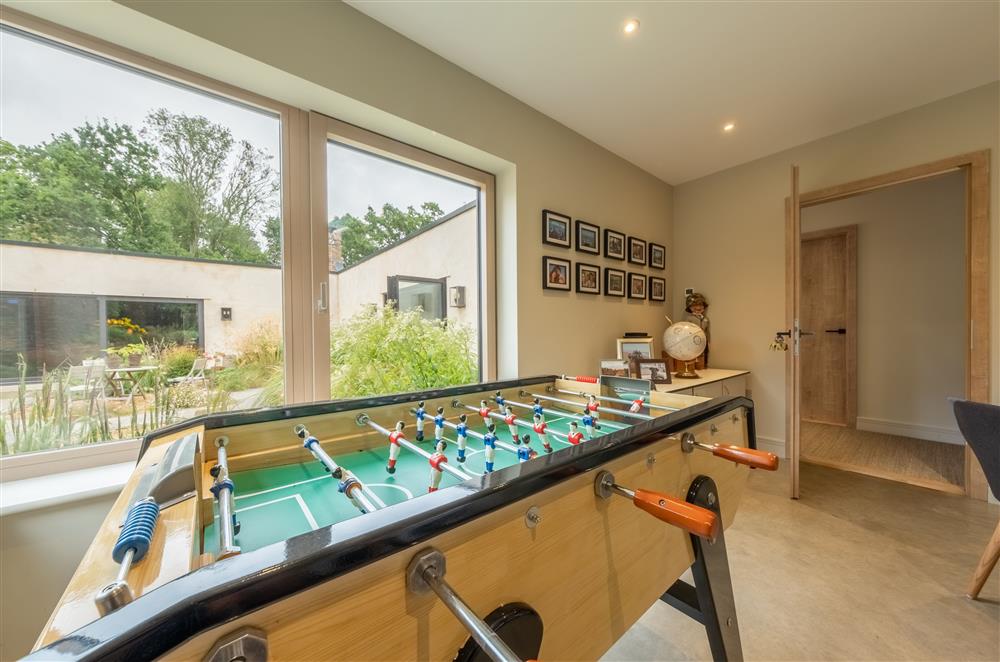 Ground floor: The study / games room with table football at Thursford Castle, Great Snoring