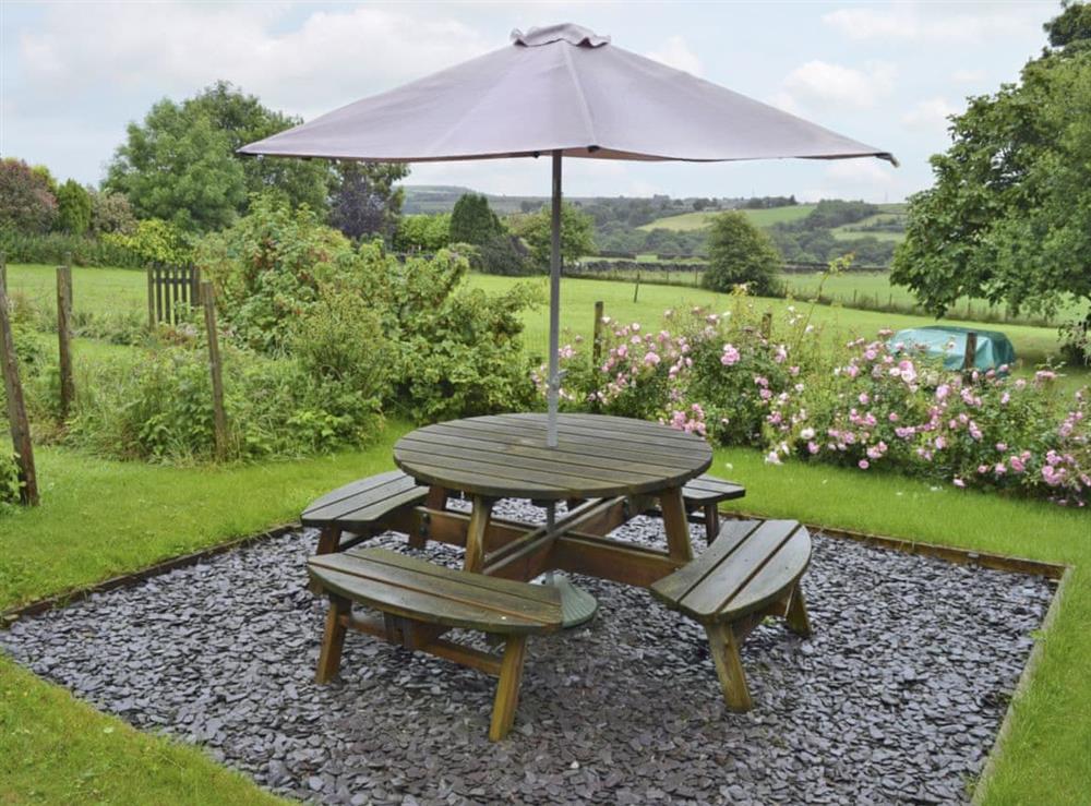 Relaxing patio with garden furniture at Thurst House Farm Studio in Ripponden, near Sowerby Bridge, Yorkshire, West Yorkshire