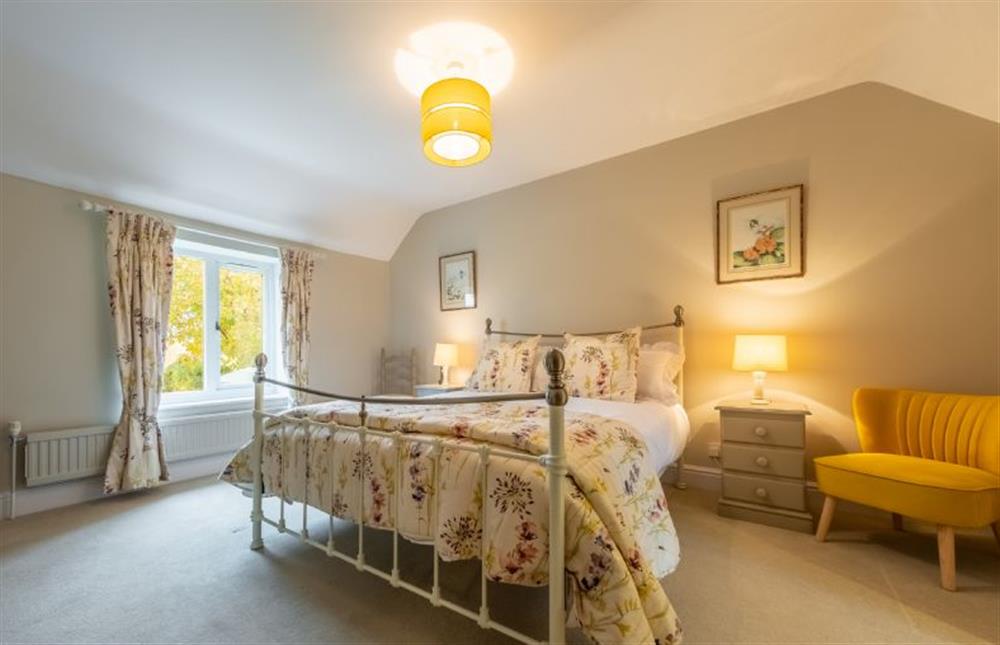 First floor: Light and spacious master bedroom with lots of light at Thyme Cottage, Thornham near Hunstanton