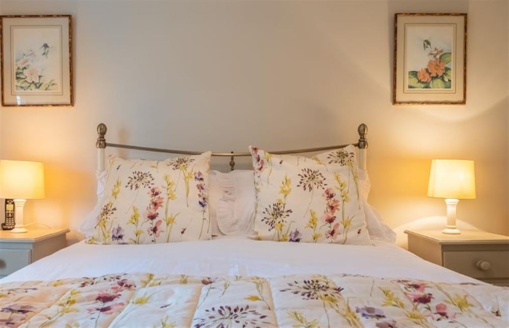First floor: Master bedroom with beautiful bed linen at Thyme Cottage, Thornham near Hunstanton