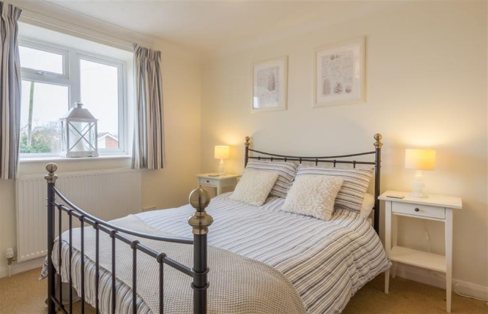 First floor: Bedroom one has lovely views over Parks Piece at Tide Cottage, Holme-next-the-Sea near Hunstanton
