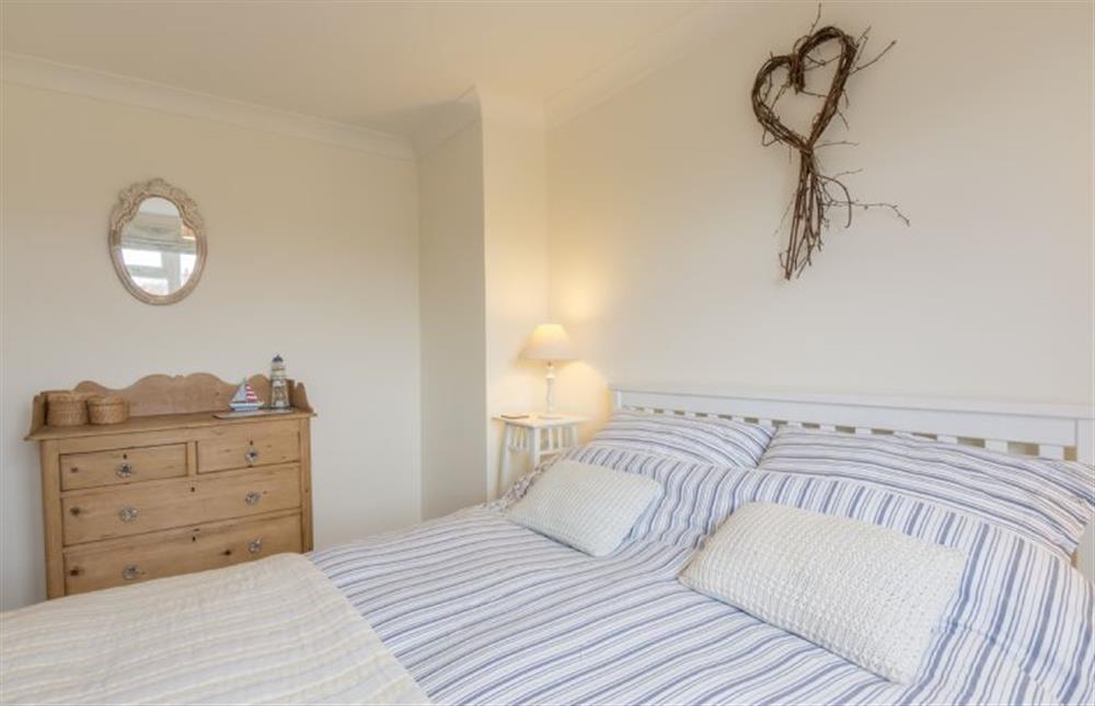 First floor: Bedroom two, another double with views over the rear garden at Tide Cottage, Holme-next-the-Sea near Hunstanton