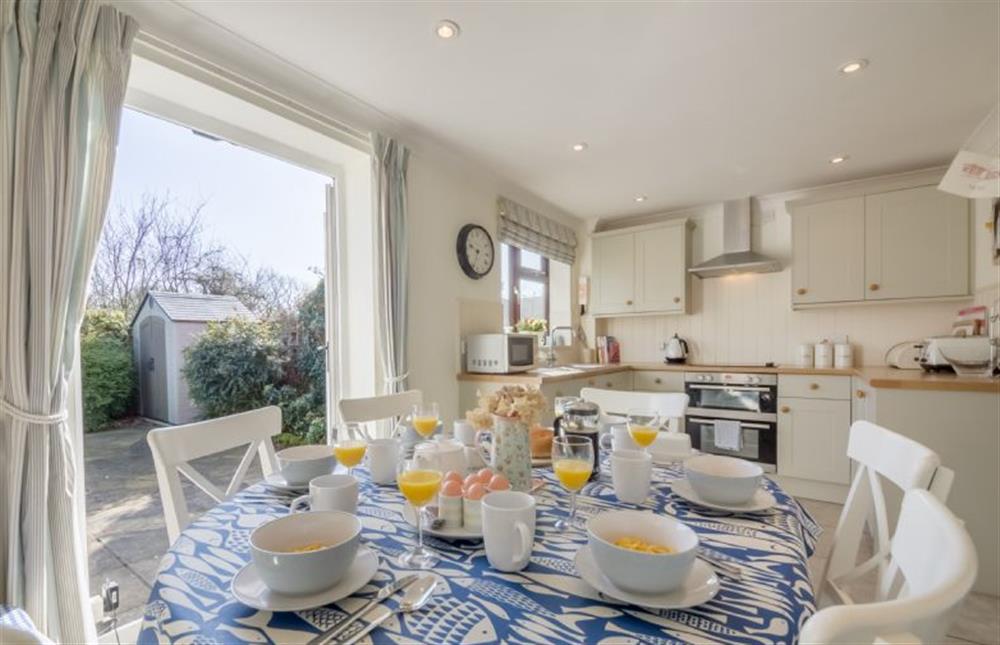 Ground floor: Dining kitchen with french doors leading to the garden at Tide Cottage, Holme-next-the-Sea near Hunstanton